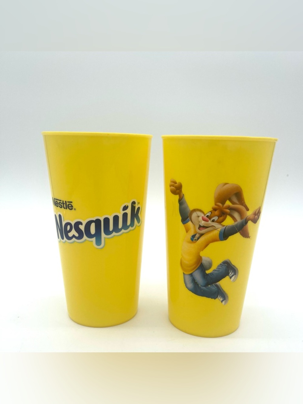 Lot of 2 Nestle Nesquik Rabbit Tall Yellow Plastic Cups Tumbler Bee Intl 6”
